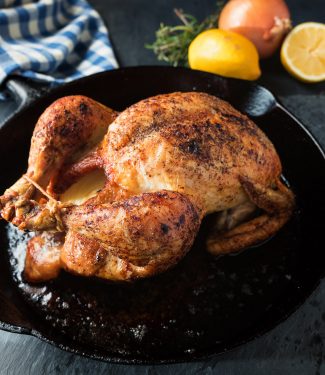 Roast chicken with lemon, white wine, rosemary and thyme sauce.