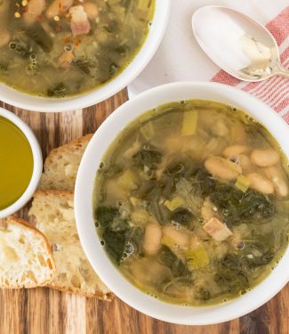 White bean swiss chard soup with leeks and bacon. A hearty, warming soup that chases away the winter blahs no matter how miserable it is out.