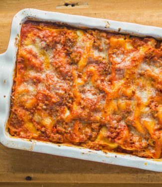 Neapolitan lasagna is a great alternative to your regular lasagna. Pork and Italian sausage meld beautifully with tomato and fresh mozzarella.