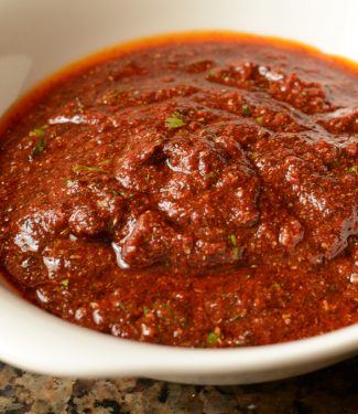 Tandoori marinade in a white bowl.