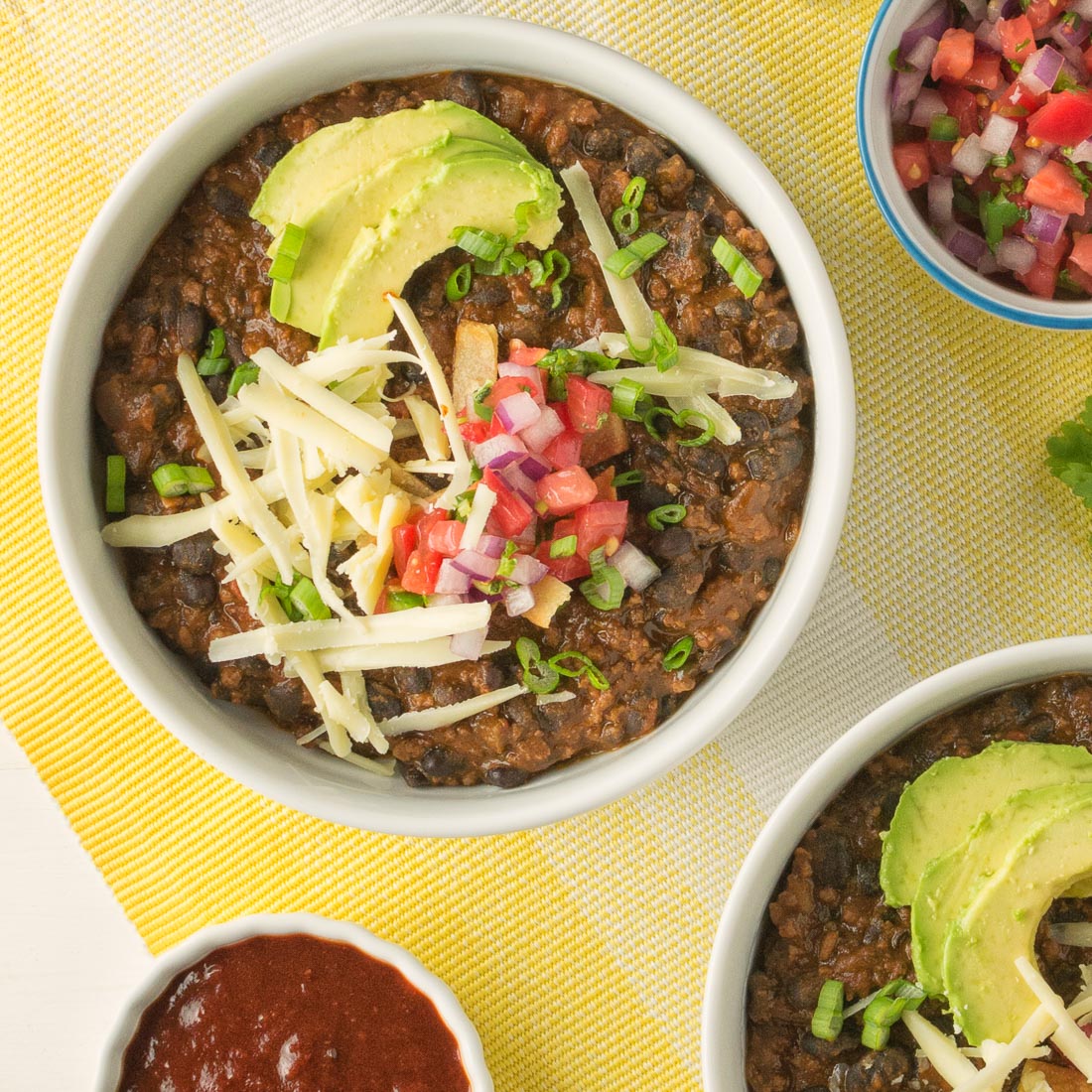 Pork, beef, new mexican red chili powder and fire roasted tomatoes all star in this black bean chili. This chili is for lovers of big flavours!