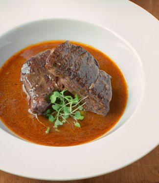 There's something unbelievably satisfying about braised short ribs. Brown them deeply, add wine, stock and a few aromatics and serve a spectacular dinner.