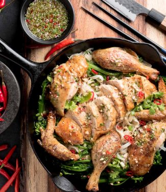 Thai roast chicken on a bed of rice noodles with Asian greens.