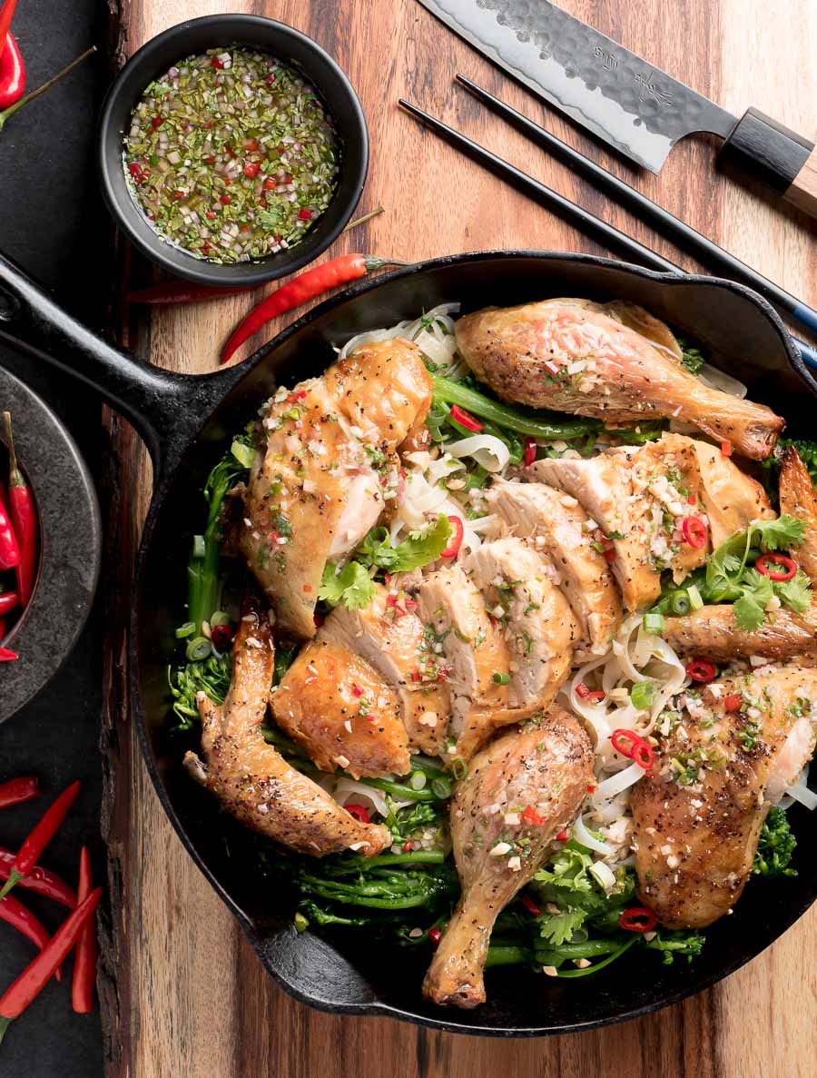 Thai roast chicken on a bed of rice noodles with Asian greens.