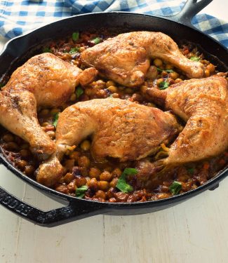 Moroccan chicken and chickpeas is a delicious, one skillet meal that comes together in an hour.