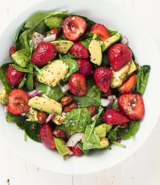 spinach salad with strawberries, avocado and poppyseed dressing is the perfect salad when berries are at their peak.