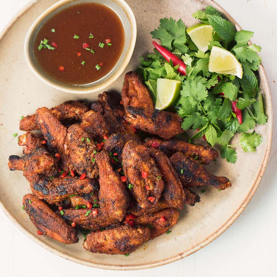 Indian spiced chicken wings with tamarind dipping sauce pack tons of flavour into what is already the world's most perfect food.