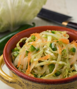 This super easy quick Mexican slaw goes with any type of taco or grilled meat.