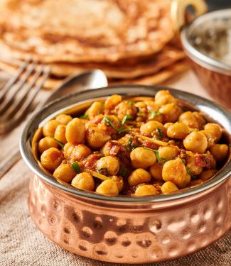 Easy chana masala in an Indian bowl from the front.