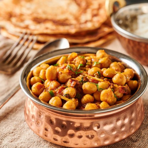 Easy chana masala in an Indian bowl from the front.