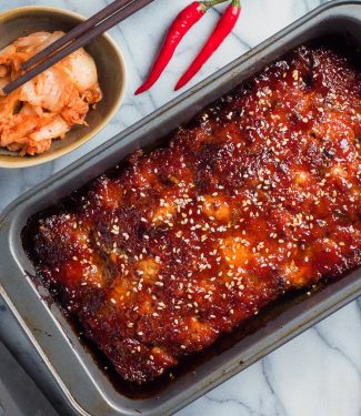 Korean meatloaf with gochugang glaze in pan from above.