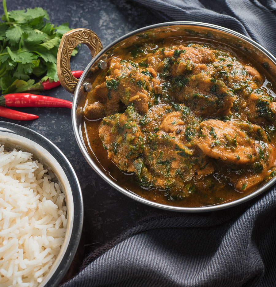 chicken saag curry in an Indian dish