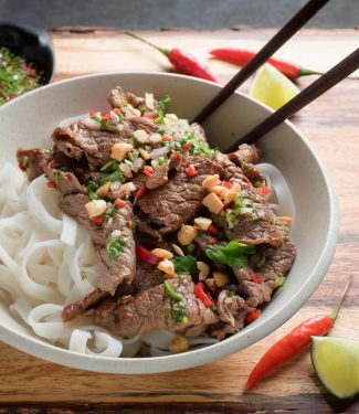 Thai beef stir fry with peanut and cilantro garnish