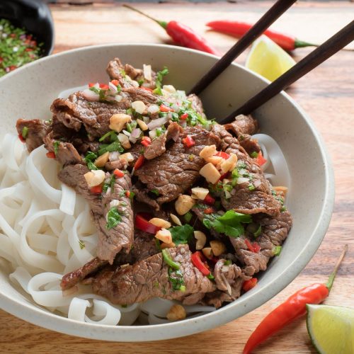 Thai beef stir fry with peanut and cilantro garnish