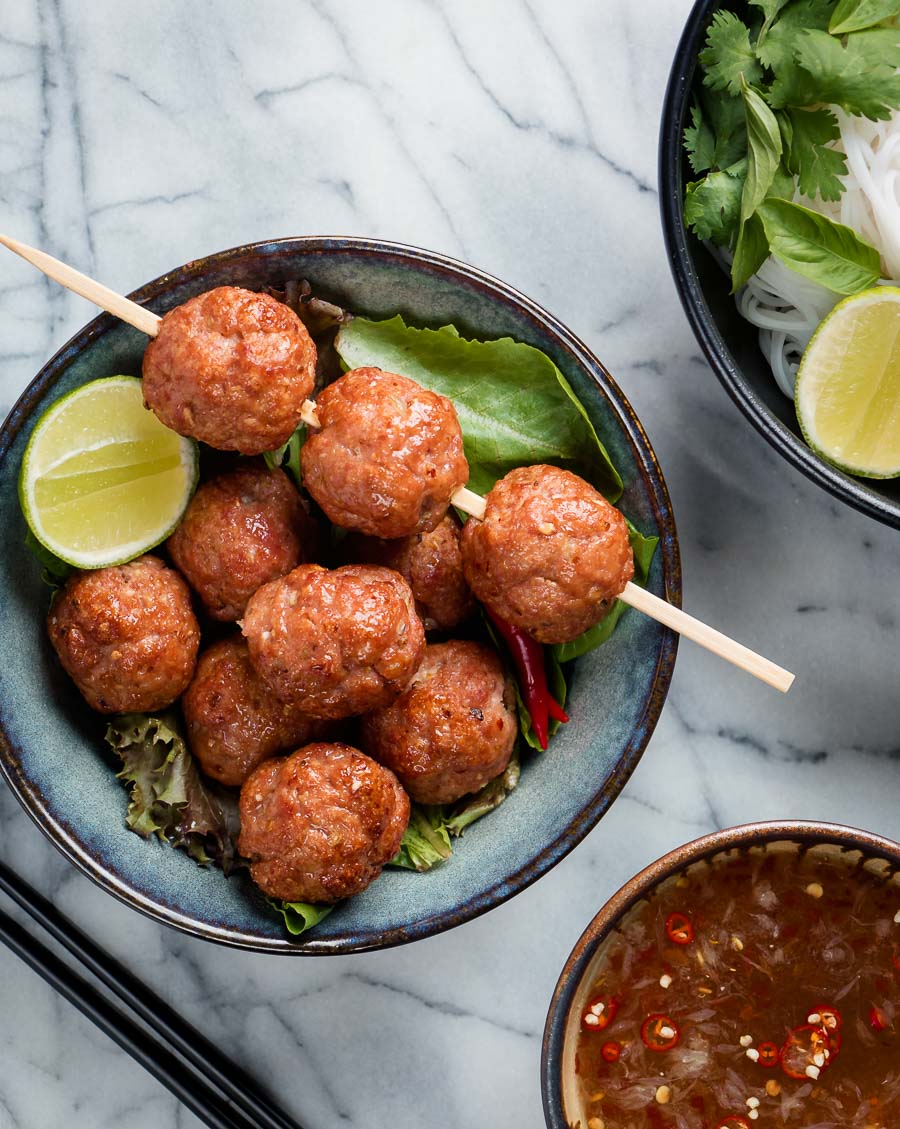 Bun cha grilled pork balls on a skewer