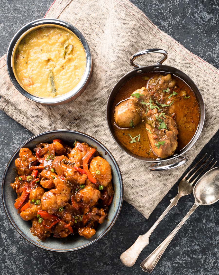 Indian dinner scene featuring gobi manchurian.