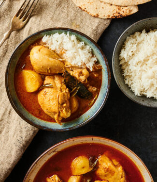 Kari ayam and rice in a bowl from above.