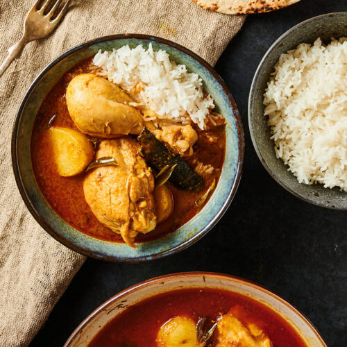 Kari ayam and rice in a bowl from above.