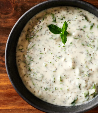 Closeup of a bowl of mint raita from above.