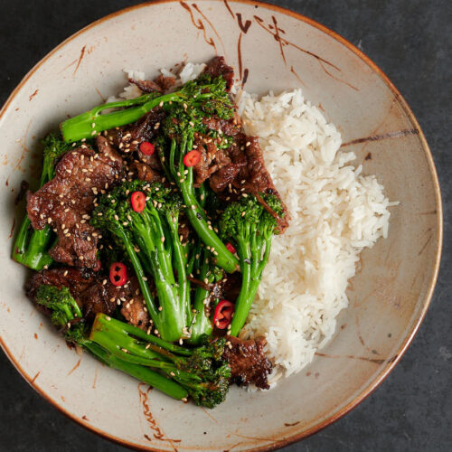 Bowl of Thai beef and broccoli and rice from above.